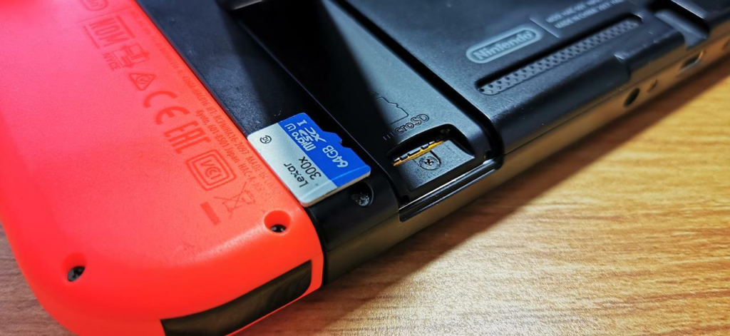 how to insert micro sd card into switch oled